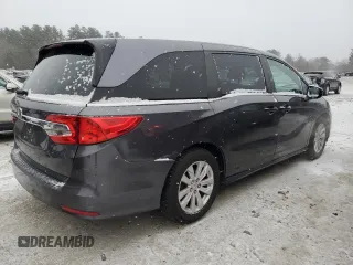 2018 Honda Odyssey LX with VIN 5FNRL6H28JB013928, listed as a Copart auction lot 87695025 with 194,390 mi miles and Salvage Title. Bid and sale history available at carsss.com. Image 3.
