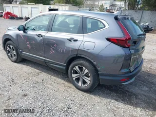 2021 Honda CR-V LX with VIN 2HKRW2H29MH632687, listed as a IAAI auction lot 41876112 with 105,301 mi miles. Bid and sale history available at carsss.com. Image 3.