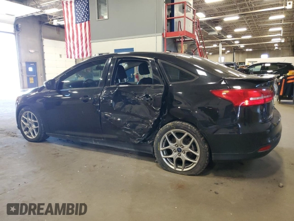 2015 Ford Focus SE with VIN 1FADP3F26FL385522, listed as a Copart auction lot 57963245 with 82,794 mi miles and Salvage title. Bid and sale history available at DreamBid. Image 2.