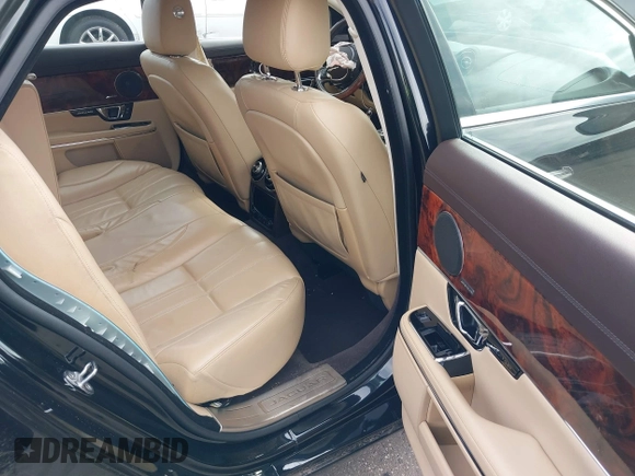 2015 Jaguar XJ with VIN SAJWA1CZ9F8V78228, listed as a IAAI auction lot 41260138 with 52,622 mi miles. Bid and sale history available at carsss.com. Image 8.