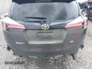 2016 Toyota RAV4 SE with VIN 2T3NFREV2GW309858, listed as a IAAI auction lot 42236828 with 129,602 mi miles and . Bid and sale history available at DreamBid. Image 17.