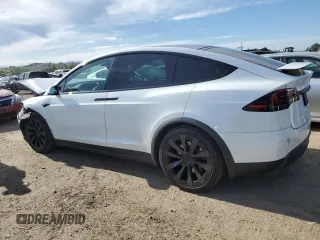 2022 Tesla Model X with VIN 7SAXCBE5XNF358319, listed as a Copart auction lot 50246555 with 12,863 mi miles and Salvage Title. Bid and sale history available at DreamBid. Image 2.