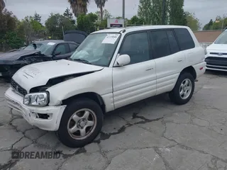 1999 Toyota RAV4 with VIN JT3GP10V3X7051445, listed as a IAAI auction lot 42115846 with 147,342 mi miles and . Bid and sale history available at DreamBid. Image 2.