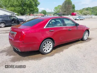 2014 Cadillac CTS AWD z VIN 1G6AW5SX3E0129127, wystawiony jako IAAI lot #42193399 z przebiegiem 108 037 mil mil oraz . Historia ofert i sprzedaży dostępna na DreamBid. Obrazek 4.