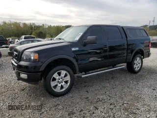 2004 Ford F-150 XLT with VIN 1FTPW145X4KC95658, listed as a Copart auction lot 71197604 with 219,018 mi miles and Salvage Title. Bid and sale history available at carsss.com. Image 1.