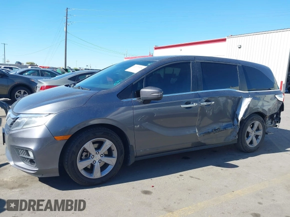 2018 Honda Odyssey EX-L z VIN 5FNRL6H7XJB067694, wystawiony jako IAAI lot #42177338 z przebiegiem 159 670 mil mil oraz . Historia ofert i sprzedaży dostępna na DreamBid. Obrazek 15.