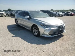 2019 Toyota Avalon XLE z VIN 4T1BZ1FB8KU005001, wystawiony jako Copart lot #54714005 z przebiegiem 62 169 mil mil oraz Czysty tytuł • Clean title. Historia ofert i sprzedaży dostępna na DreamBid. Obrazek 13.