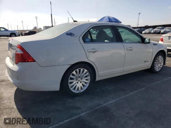 2012 Ford Fusion Hybrid z VIN 3FADP0L38CR171141, wystawiony jako Copart lot #61492425 z przebiegiem 275 312 mil mil oraz Czysty tytuł • Clean title. Historia ofert i sprzedaży dostępna na DreamBid. Obrazek 3.