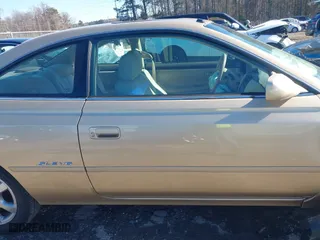 2000 Toyota Camry Solara SE with VIN 2T1CF28P9YC320914, listed as a IAAI auction lot 41319787 with 129,875 mi miles. Bid and sale history available at carsss.com. Image 14.
