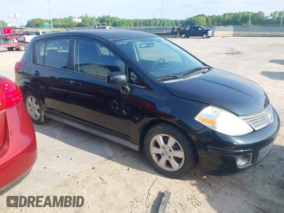 2007 Nissan Versa 1.8 S with VIN 3N1BC13E97L359537, listed as a IAAI auction lot 42127935 with 128,891 mi miles. Bid and sale history available at carsss.com. Image 1.