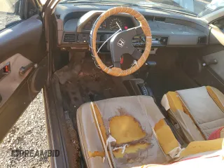 1986 Honda Civic z VIN JHMAH7329GS021008, wystawiony jako Copart lot #79475154 z przebiegiem 113 888 mil mil oraz Tytuł czysty. Historia ofert i sprzedaży dostępna na DreamBid. Obrazek 9.
