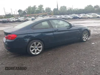 2014 BMW 4 Series 435i xDrive with VIN WBA3R5C58EK188668, listed as a IAAI auction lot 39946954 with 89,513 mi miles and . Bid and sale history available at DreamBid. Image 4.
