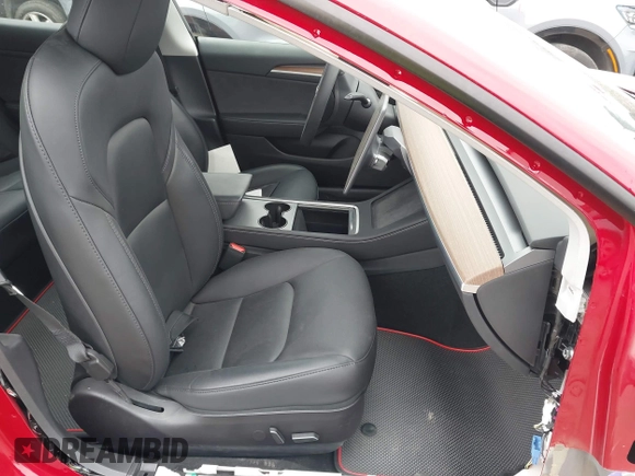 2022 Tesla Model 3 Performance with VIN 5YJ3E1ECXNF329188, listed as a IAAI auction lot 41308371 with 15,220 mi miles and . Bid and sale history available at DreamBid. Image 5.