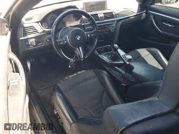 2015 BMW M4 with VIN WBS3R9C50FK333819, listed as a Copart auction lot 61105565 with 168,932 mi miles and Salvage title. Bid and sale history available at DreamBid. Image 8.