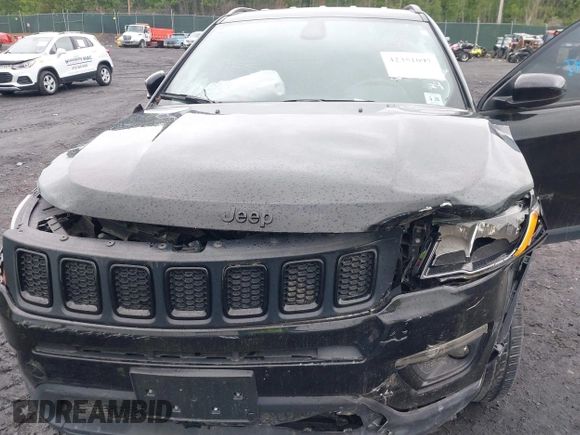 2021 Jeep Compass Latitude with VIN 3C4NJDBB6MT590092, listed as a IAAI auction lot 42351097 with 72,428 mi miles and . Bid and sale history available at DreamBid. Image 6.