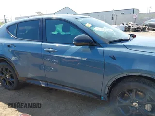 2024 Dodge Hornet R/T Plus with VIN ZACPDFDW1R3A09454, listed as a IAAI auction lot 42102576 with 12,720 mi miles and . Bid and sale history available at DreamBid. Image 14.