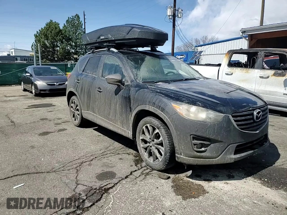 2016 Mazda CX-5 Grand Touring with VIN JM3KE4DYXG0730145, listed as a Copart auction lot 51666535 with 117,677 mi miles and Salvage Title. Bid and sale history available at carsss.com. Image 11.
