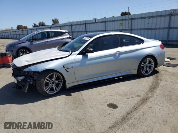 2015 BMW M4 with VIN WBS3R9C52FK334020, listed as a Copart auction lot 51867985 with 95,369 mi miles and Salvage title. Bid and sale history available at DreamBid. Image 1.