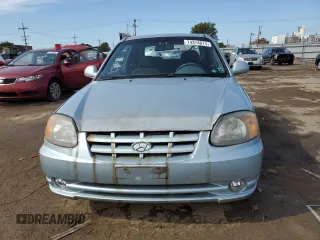 2005 Hyundai Accent GLS with VIN KMHCG35CX5U335873, listed as a Copart auction lot 74374674 with 91,381 mi miles and Clean Title. Bid and sale history available at carsss.com. Image 5.