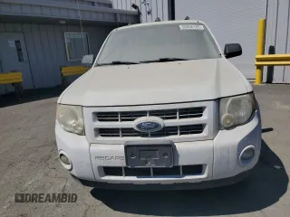 2011 Ford Escape Hybrid z VIN 1FMCU5K39BKA88197, wystawiony jako Copart lot #50896195 z przebiegiem 186 007 mil mil oraz Czysty tytuł • Clean title. Historia ofert i sprzedaży dostępna na DreamBid. Obrazek 5.