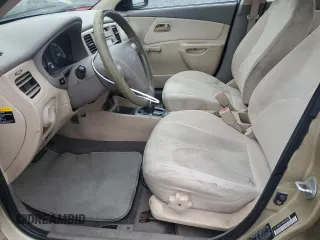 2009 Kia Rio LX with VIN KNADE223096485561, listed as a Copart auction lot 73412874 with 137,858 mi miles and Salvage Title. Bid and sale history available at DreamBid. Image 7.