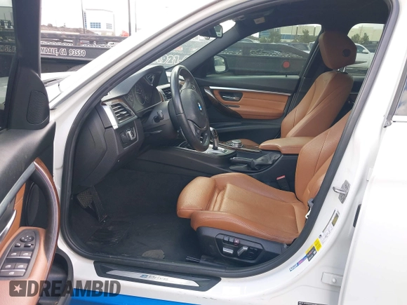 2017 BMW 3 Series 330e iPerformance with VIN WBA8E1C51HK895223, listed as a IAAI auction lot 41492625 with 116,486 mi miles. Bid and sale history available at carsss.com. Image 5.