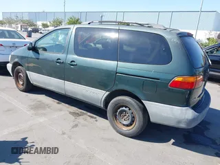 2000 Toyota Sienna LE with VIN 4T3ZF13CXYU312352, listed as a IAAI auction lot 42629403 with 166,361 mi miles and . Bid and sale history available at DreamBid. Image 3.