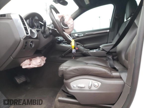 2017 Porsche Cayenne with VIN WP1AA2A24HKA81225, listed as a Copart auction lot 68863544 with 80,828 mi miles and Salvage title. Bid and sale history available at DreamBid. Image 7.