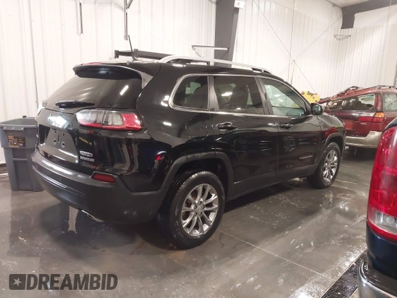 2021 Jeep Cherokee Latitude Lux with VIN 1C4PJMMX2MD107902, listed as a IAAI auction lot 41229913 with 61,195 mi miles and . Bid and sale history available at DreamBid. Image 4.