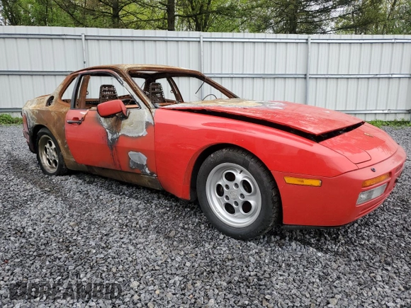 1986 Porsche 944 z VIN WP0AA0958GN152718, wystawiony jako Copart lot #55963875 z przebiegiem Nie podano mil oraz Szkoda całkowita • Salvage title. Historia ofert i sprzedaży dostępna na DreamBid. Obrazek 4.