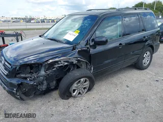 2005 Honda Pilot EX-L with NAVI with VIN 2HKYF18715H562492, listed as a IAAI auction lot 41627194 with 184,653 mi miles. Bid and sale history available at carsss.com. Image 2.