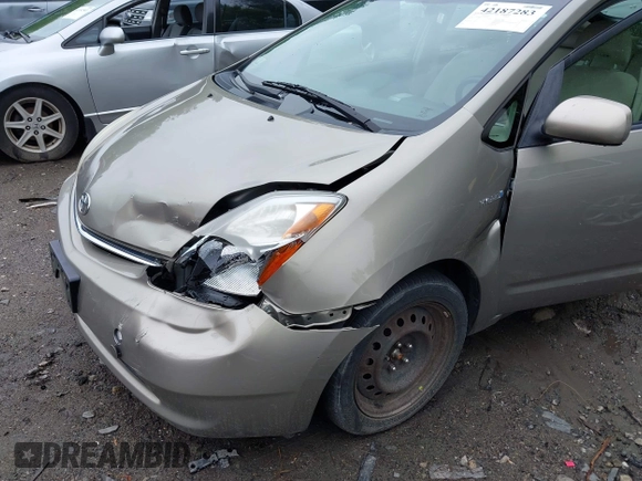 2007 Toyota Prius z VIN JTDKB20U377590729, wystawiony jako IAAI lot #42187283 z przebiegiem 156 047 mil mil oraz . Historia ofert i sprzedaży dostępna na DreamBid. Obrazek 6.