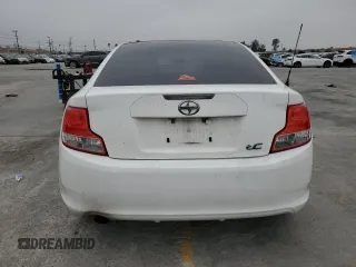 2013 Scion tC z VIN JTKJF5C77D3056779, wystawiony jako Copart lot #57459935 z przebiegiem 157 420 mil mil oraz Szkoda całkowita • Salvage title. Historia ofert i sprzedaży dostępna na DreamBid. Obrazek 6.