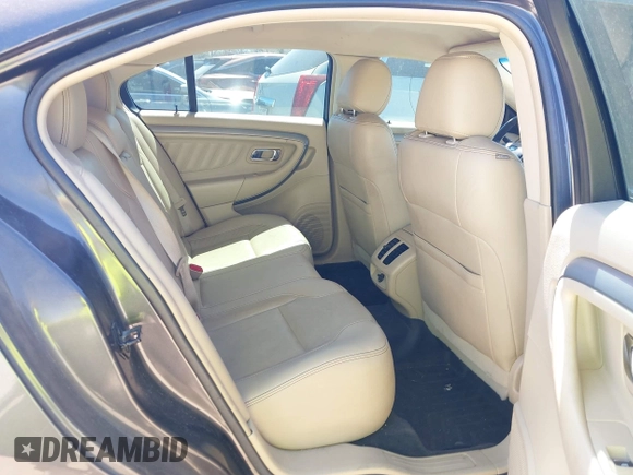 2015 Ford Taurus SEL with VIN 1FAHP2E84FG177553, listed as a IAAI auction lot 41753755 with 153,252 mi miles and . Bid and sale history available at carsss.com. Image 8.