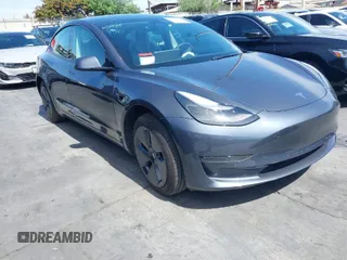 2022 Tesla Model 3 with VIN 5YJ3E1EA0NF344782, listed as a IAAI auction lot 41803469 with 16,973 mi miles and . Bid and sale history available at DreamBid. Image 1.