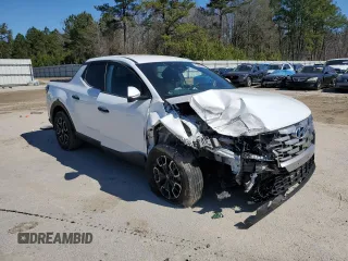 2022 Hyundai Santa Cruz SEL z VIN 5NTJBDAE5NH014097, wystawiony jako Copart lot #46309765 z przebiegiem 24 938 mil mil oraz Szkody całkowita. Historia ofert i sprzedaży dostępna na DreamBid. Obrazek 4.