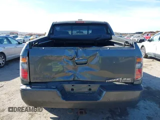 2007 Honda Ridgeline RTL z VIN 2HJYK16547H526249, wystawiony jako IAAI lot #41769625 z przebiegiem 173 168 mil mil oraz . Historia ofert i sprzedaży dostępna na DreamBid. Obrazek 16.