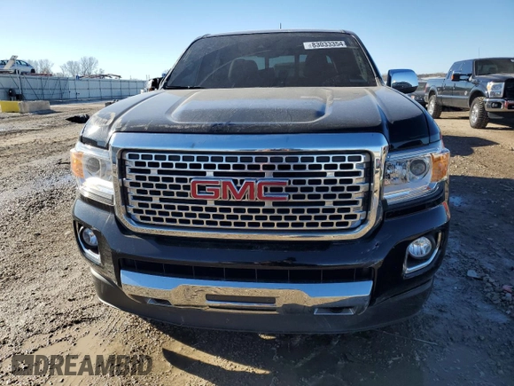 2020 GMC Canyon 4WD Denali with VIN 1GTG6EEN2L1131363, listed as a Copart auction lot 83033354 with 52,694 mi miles and Salvage Title. Bid and sale history available at carsss.com. Image 5.