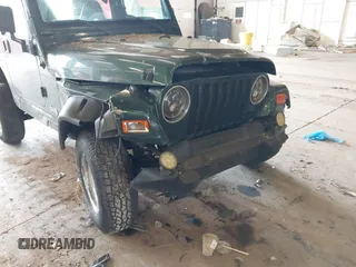 2000 Jeep Wrangler Sport with VIN 1J4FA49S8YP780104, listed as a IAAI auction lot 42095731 with Not provided miles and . Bid and sale history available at DreamBid. Image 14.