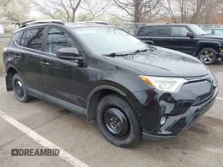 2016 Toyota RAV4 LE with VIN 2T3BFREV3GW447802, listed as a IAAI auction lot 41985438 with 213,247 mi miles. Bid and sale history available at carsss.com. Image 1.
