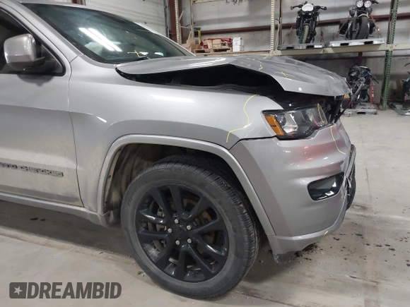 2018 Jeep Grand Cherokee Laredo E with VIN 1C4RJFAG6JC102969, listed as a IAAI auction lot 41963137 with 112,361 mi miles and . Bid and sale history available at DreamBid. Image 18.