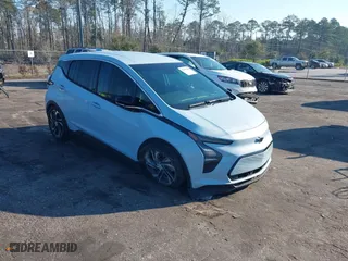 2023 Chevrolet Bolt EV 2LT with VIN 1G1FX6S00P4130054, listed as a IAAI auction lot 41677924 with 28,956 mi miles. Bid and sale history available at carsss.com. Image 1.