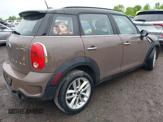 2014 MINI Countryman S z VIN WMWZC5C54EWM17898, wystawiony jako IAAI lot #42343469 z przebiegiem 112 773 mil mil oraz . Historia ofert i sprzedaży dostępna na DreamBid. Obrazek 4.