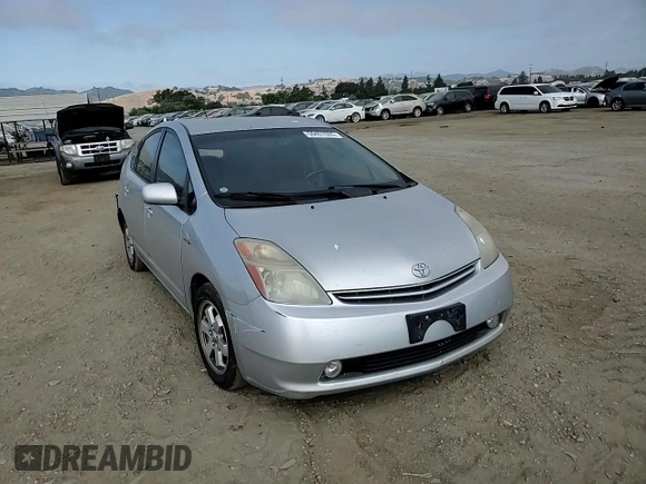 2006 Toyota Prius z VIN JTDKB20U167071838, wystawiony jako Copart lot #59407885 z przebiegiem 234 172 mil mil oraz Szkoda całkowita • Salvage title. Historia ofert i sprzedaży dostępna na DreamBid. Obrazek 14.