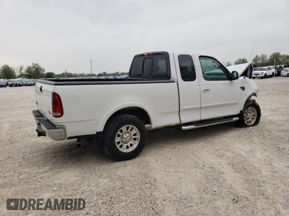 2002 Ford F-150 XL with VIN 1FTRX18L42NB60380, listed as a Copart auction lot 51806955 with 293,591 mi miles and Salvage title. Bid and sale history available at DreamBid. Image 3.