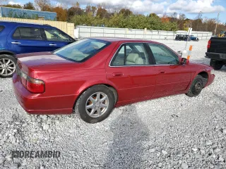 1999 Cadillac Seville Touring STS z VIN 1G6KY5490XU919543, wystawiony jako Copart lot #77068624 z przebiegiem 142 772 mil mil oraz Szkoda całkowita • Salvage title. Historia ofert i sprzedaży dostępna na DreamBid. Obrazek 3.
