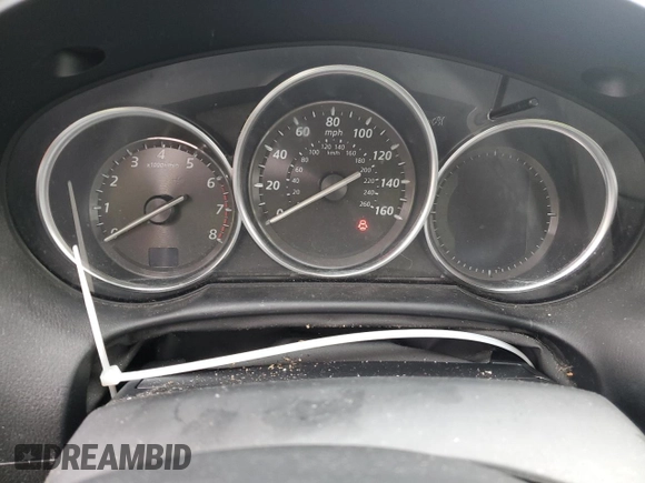 2015 Mazda CX-5 Sport z VIN JM3KE4BY2F0516574, wystawiony jako Copart lot #84100544 z przebiegiem Nie podano mil oraz Szkoda całkowita • Salvage title. Historia ofert i sprzedaży dostępna na DreamBid. Obrazek 9.