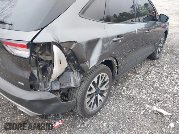 2020 Ford Escape SE Sport Hybrid with VIN 1FMCU0BZ7LUB13398, listed as a IAAI auction lot 41942498 with 118,604 mi miles and . Bid and sale history available at DreamBid. Image 6.