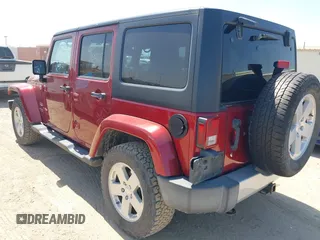 2012 Jeep Wrangler Unlimited Sahara with VIN 1C4BJWEG2CL209600, listed as a IAAI auction lot 42015290 with 133,229 mi miles and . Bid and sale history available at DreamBid. Image 3.