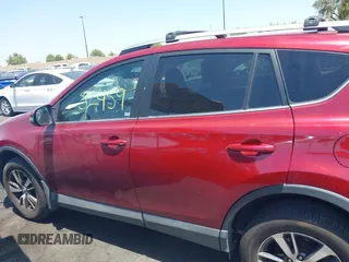2018 Toyota RAV4 XLE with VIN 2T3WFREV4JW505053, listed as a IAAI auction lot 42552459 with 94,552 mi miles and . Bid and sale history available at DreamBid. Image 15.